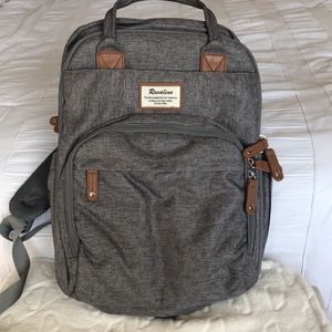 RUVALINO modern diaper bag backpack hold all your baby's gear Never used.